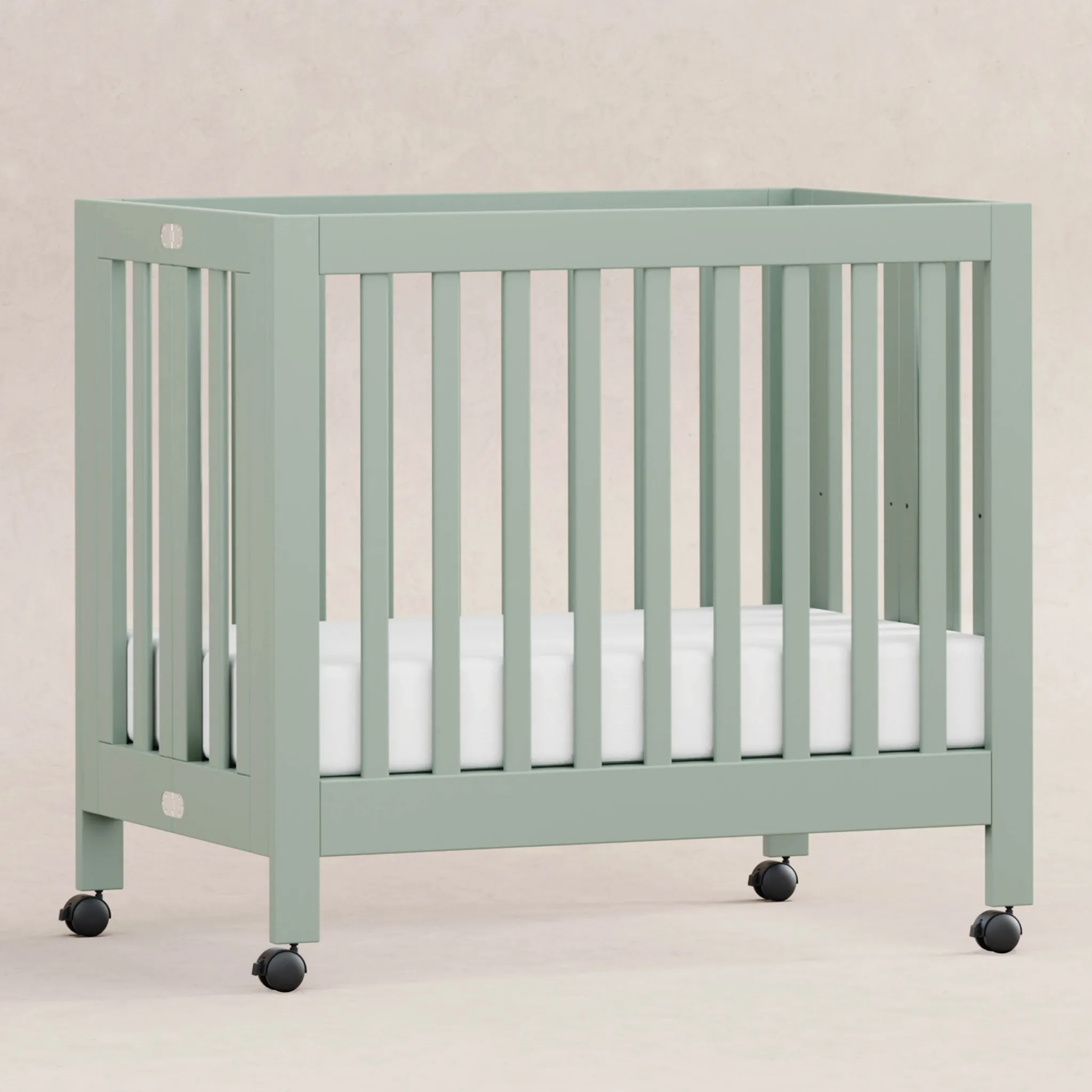 Origami Mini Portable Folding Crib with Wheels - Light Sage - Image 5